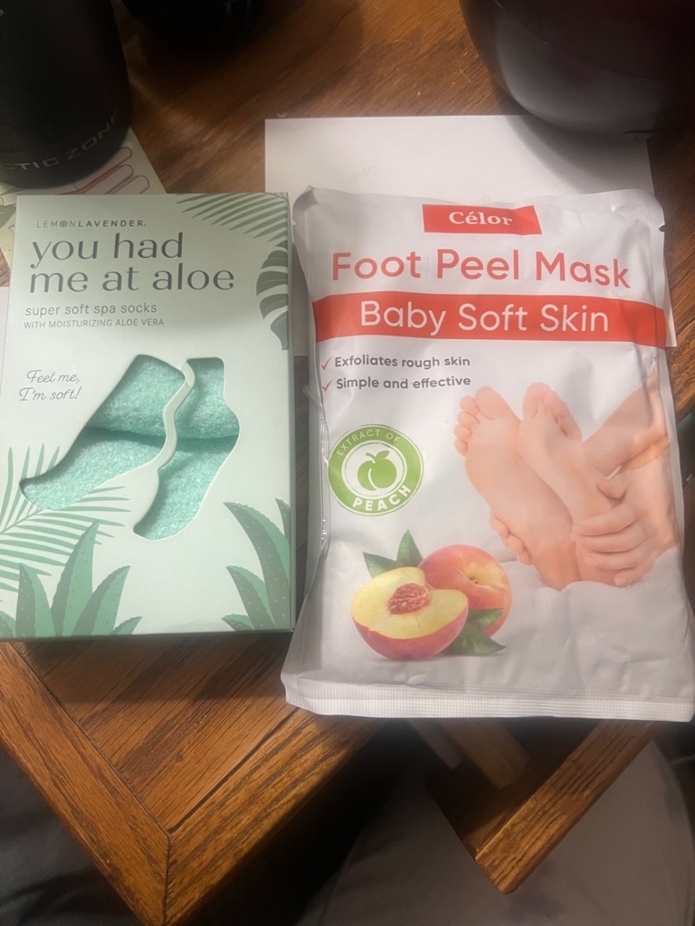 Feet care lot-You Had Me At Aloe Super Soft Spa Socks  and a foot peel mask.
